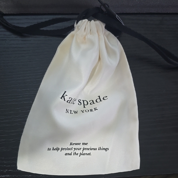 Kate Spade Cream Drawstring Bag